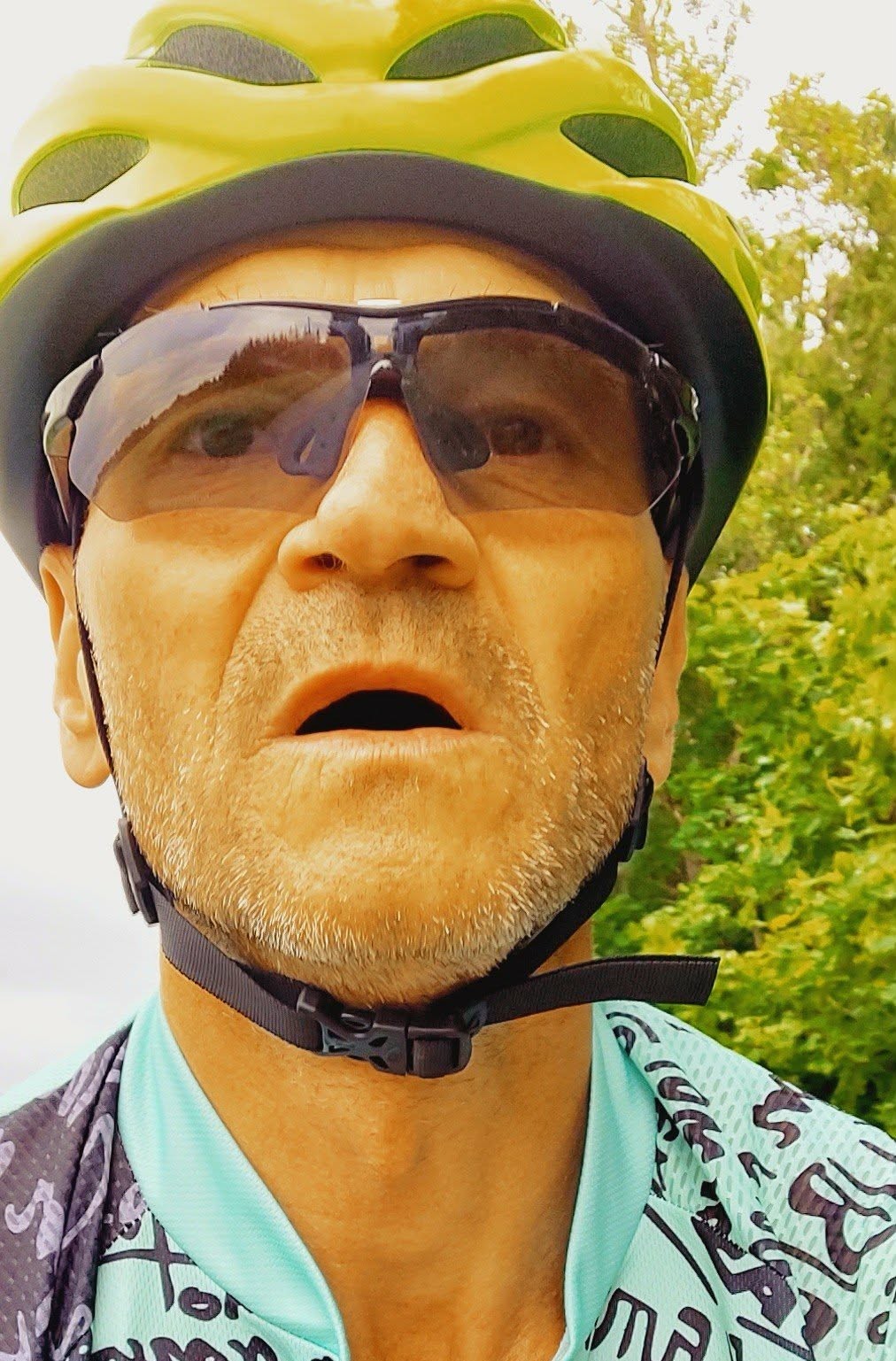 Active 55-year-old walking in the woods